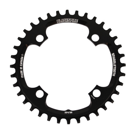 421584040.jpg CORONA SNAGGLETOOTH BCD 104 MM 4-FORI 1 X 11/12V - 32 DENTI, NERO - 32 DENTI, NERO